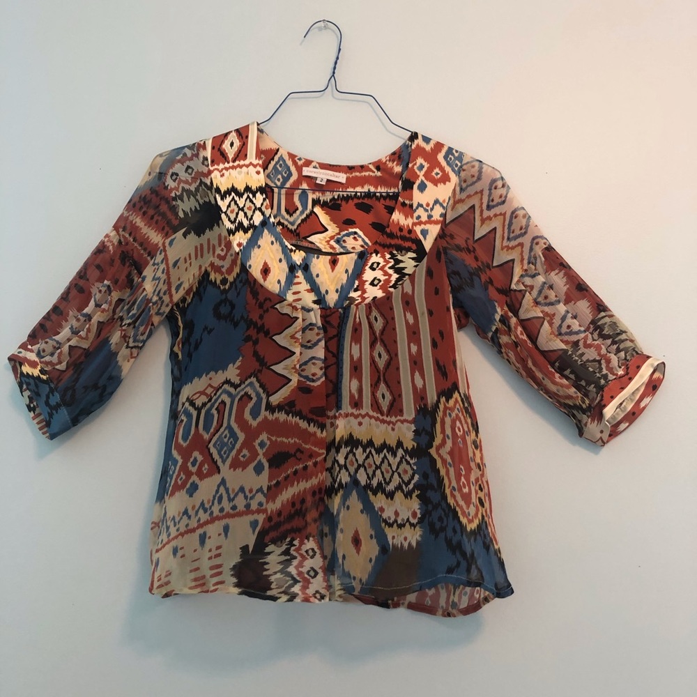 Sheer, multicolored top.
